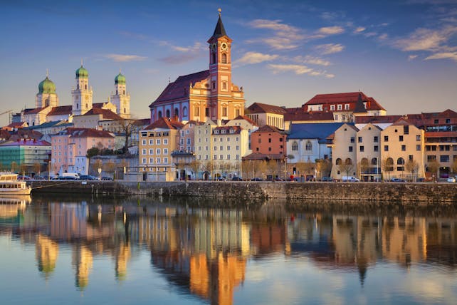Sunset over pretty coloured houses and churches in Passau