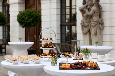 Taschenbergpalais breakfast served in inner courtyard, fruits and cake