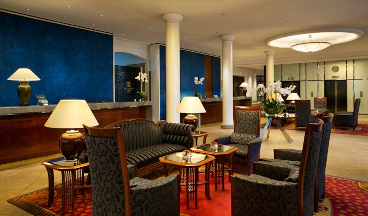 Taschenbergpalais lobby and reception area, sofas and chairs, colourful and elegant decor