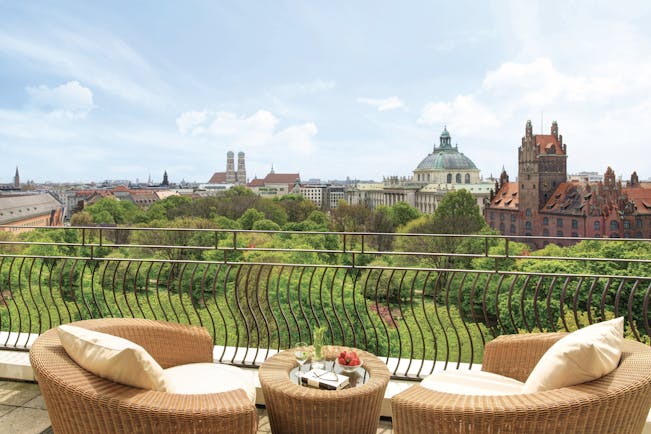 View from the balcony of the Monforte suite looking over Munich and lots of greenery 