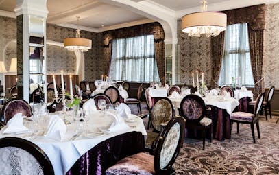 Bovey Castle Devon dining with brown chairs