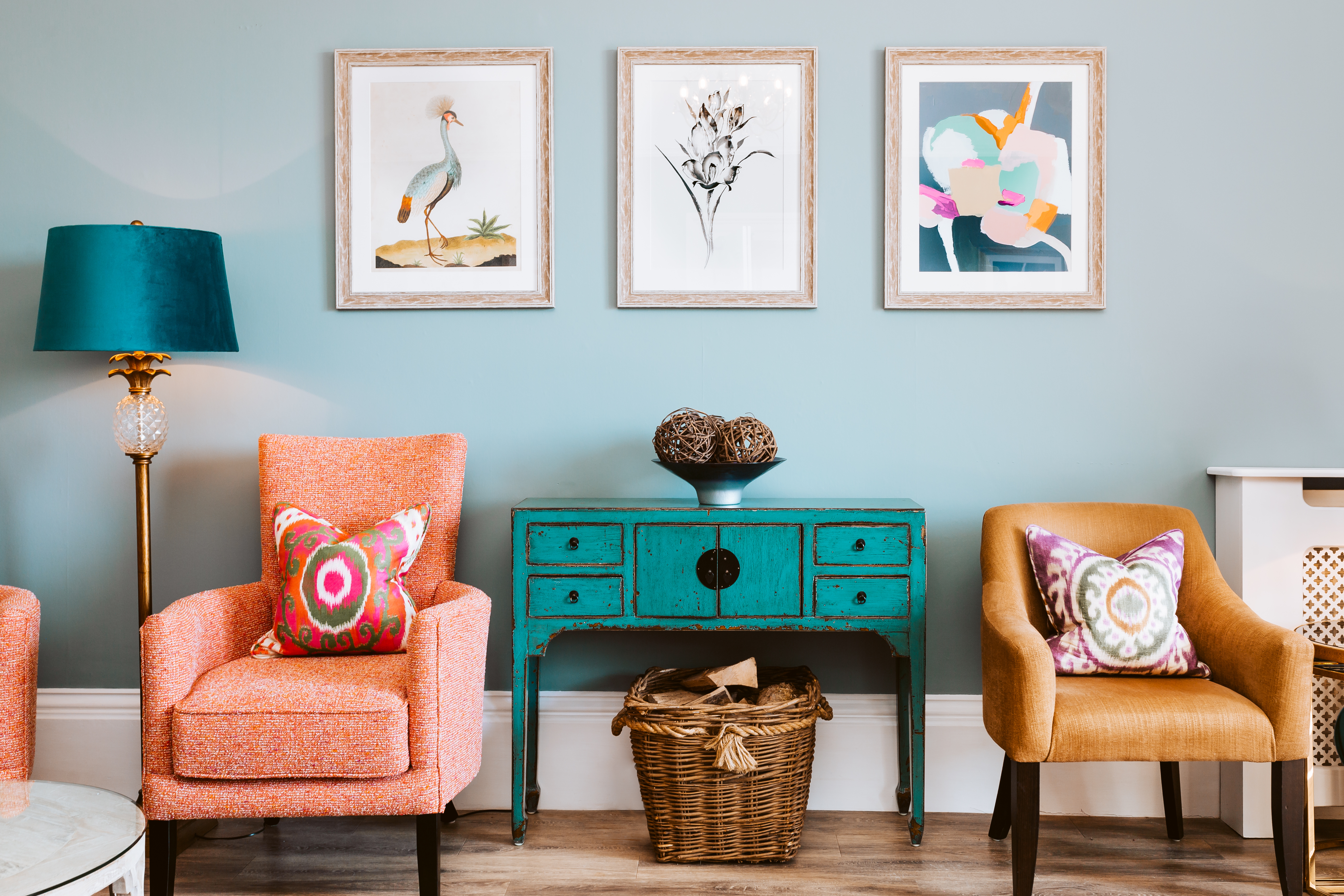 Horn of Plenty Devon orange chairs and blue cupboard