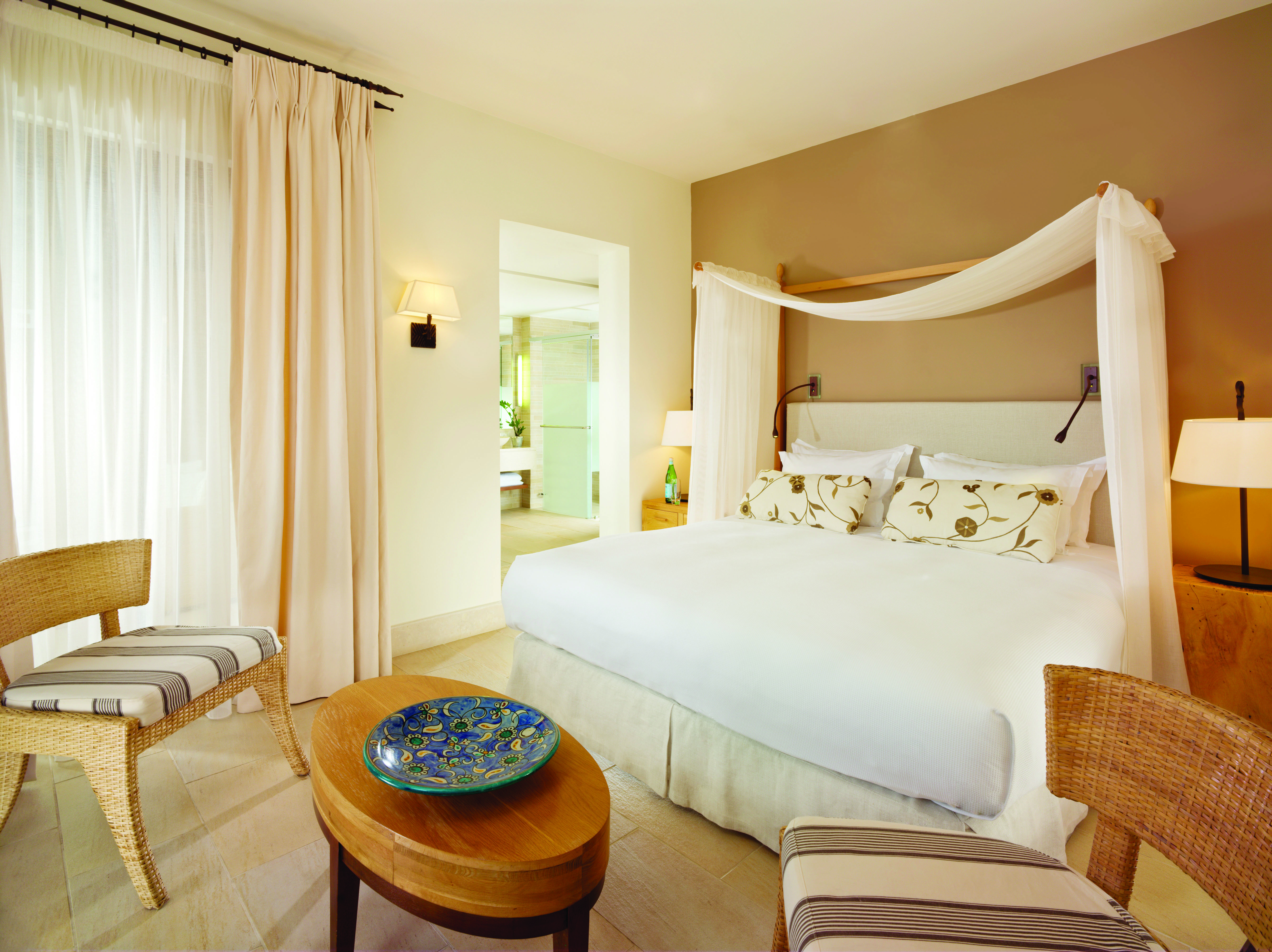 Blue Palace Greece outdoor dining sea view dining area traditional decor