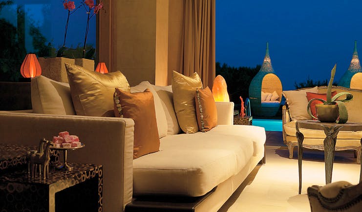 Cape Sounio Greece lounge sofas platter of Turkish delight salt lamp