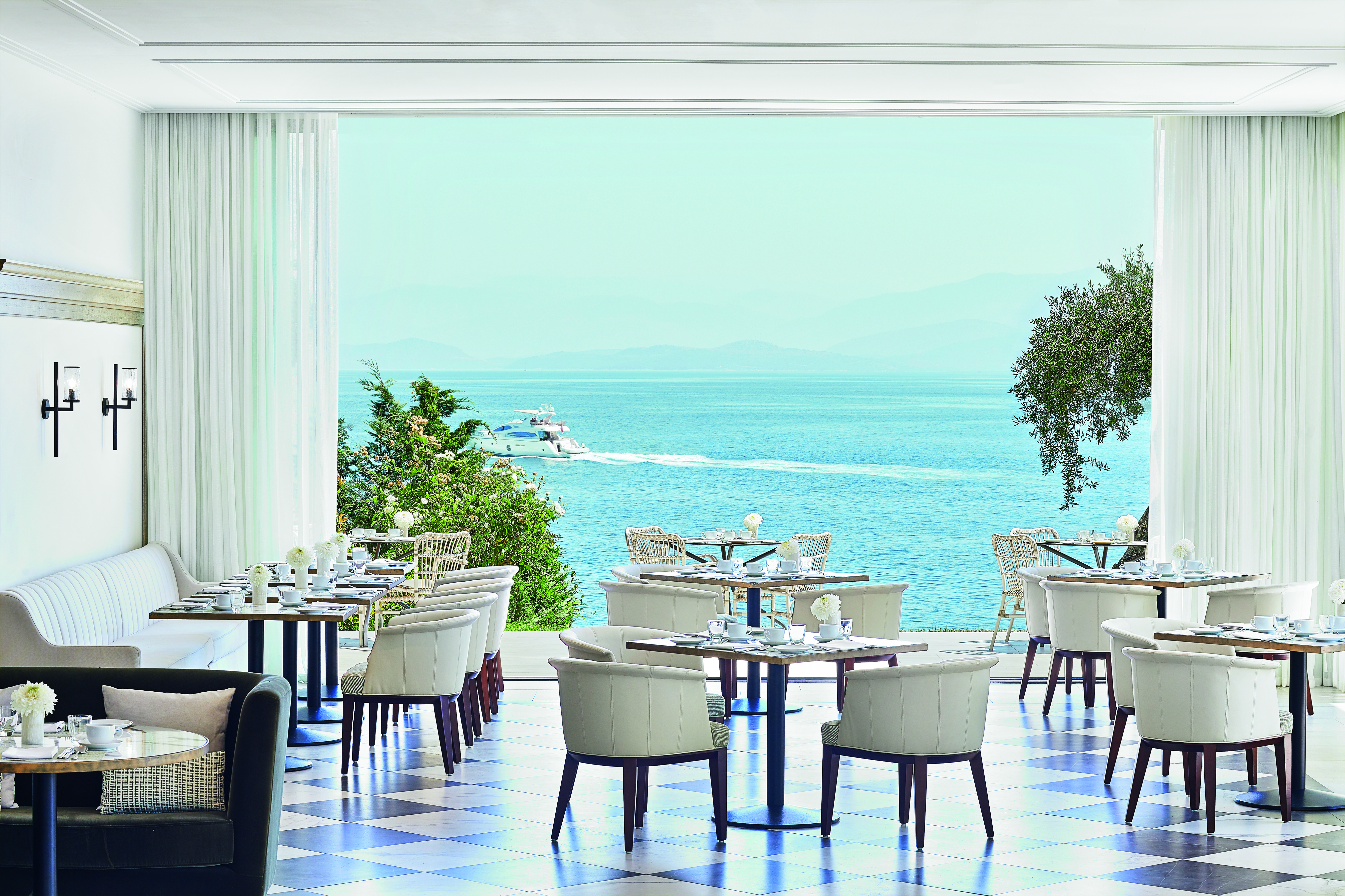 White restaurant with sea views Corfu Imperial