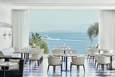 White restaurant with sea views Corfu Imperial