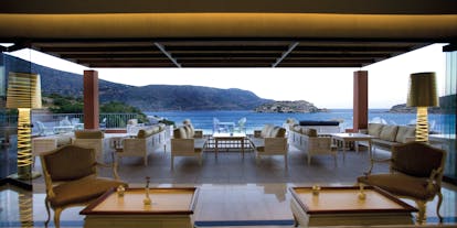 Domes of Elounda Greece outdoor  lounge terrace area with sea views