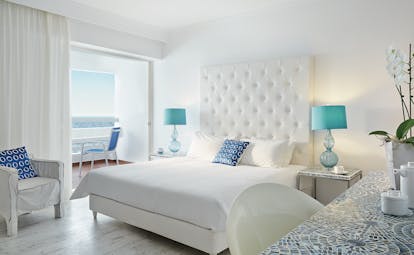 Grecotel White Palace white and turquoise room