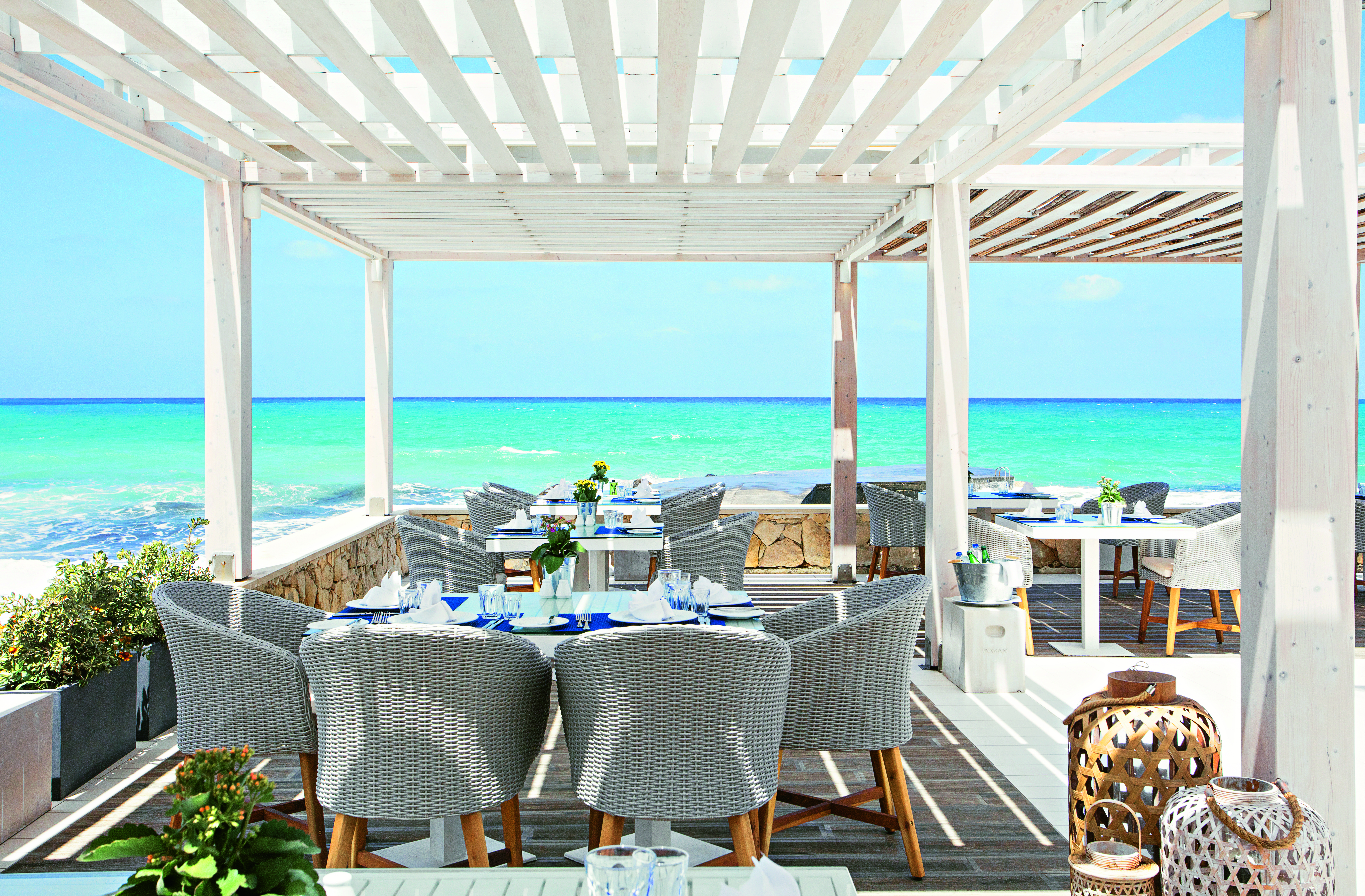 Grecotel White Palace restaurant by the sea