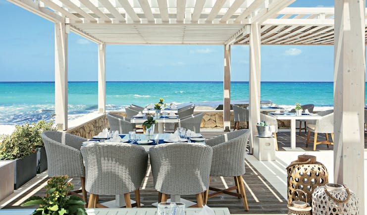 Grecotel White Palace restaurant by the sea