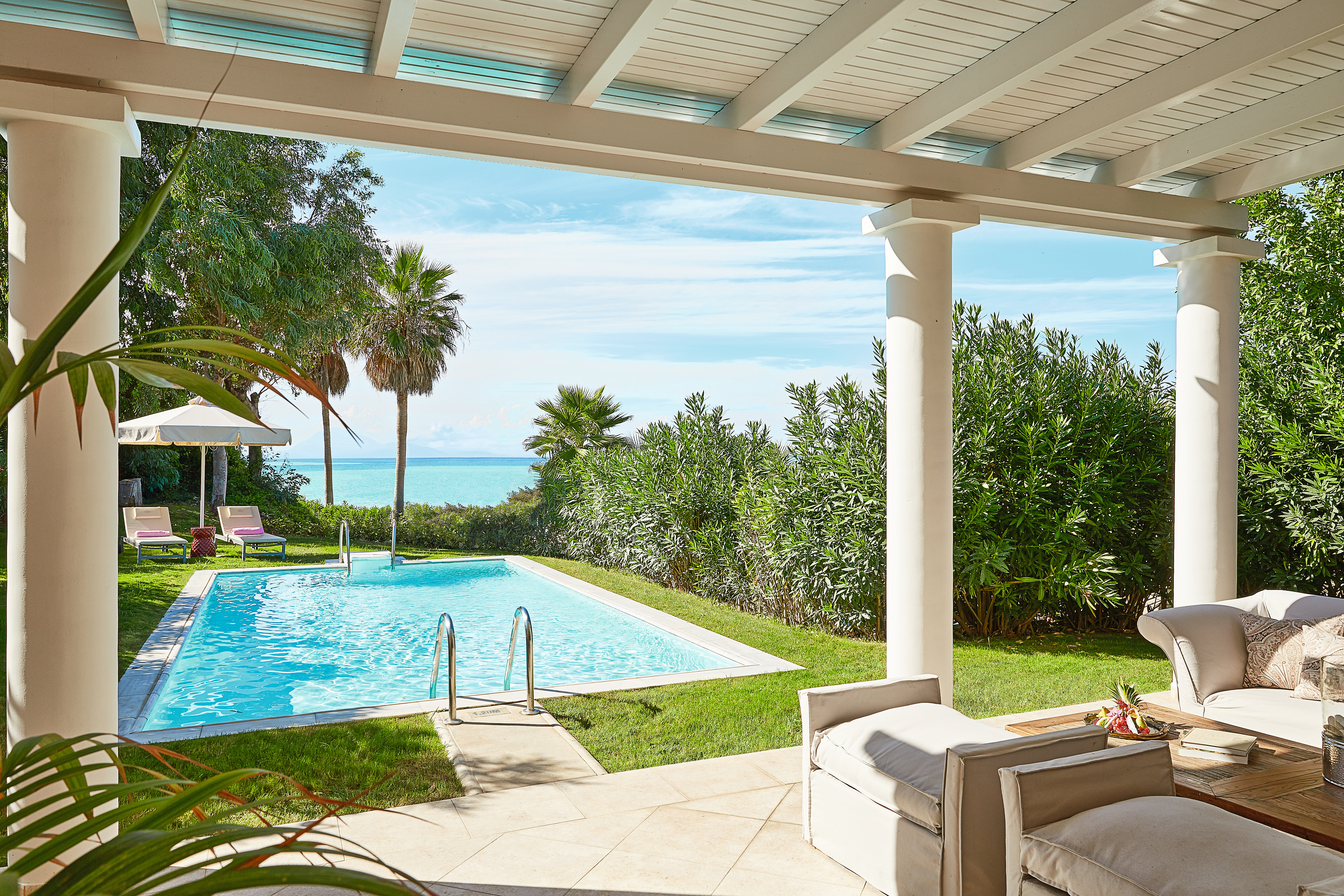 Grecotel Mandola Rosa Greece marble villa pool outdoor seating area with private pool and sea view