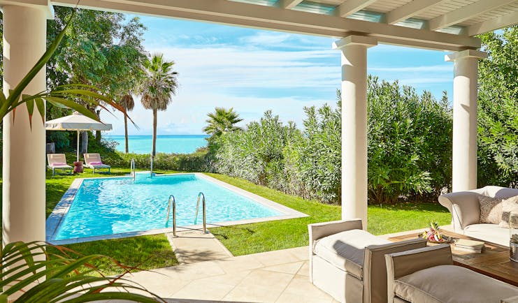 Grecotel Mandola Rosa Greece marble villa pool outdoor seating area with private pool and sea view