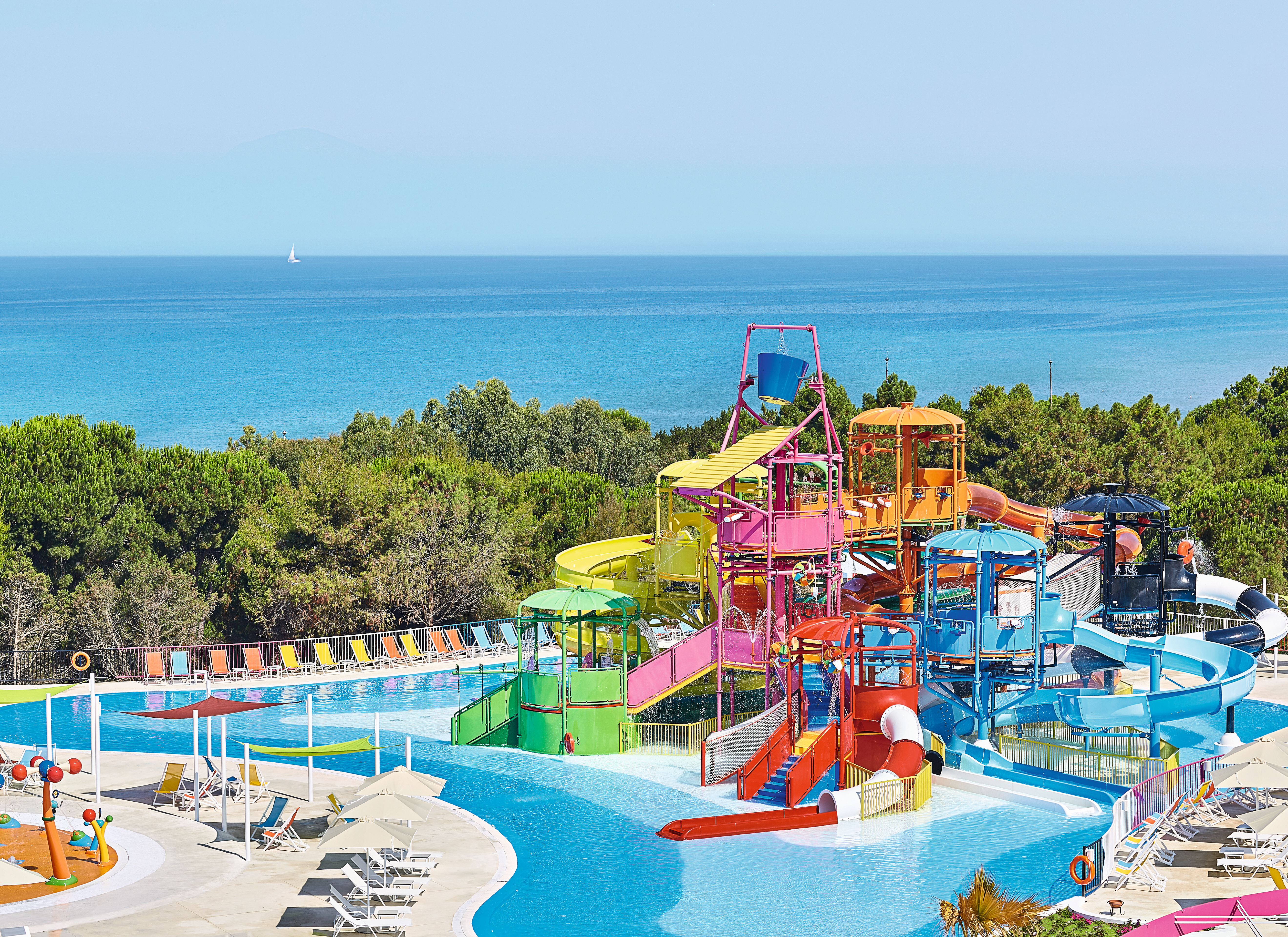 Grecotel Mandola Rosa Greece play area multi story childrens play area next to pool