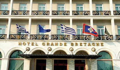 Hotel Grande Bretagne Greece exterior signage Greek flags balconies