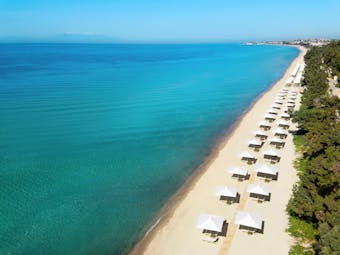 Ikos Oceania Greece beach with many white pergolas