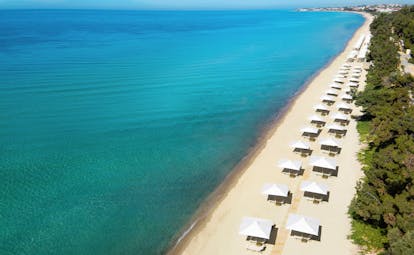 Ikos Oceania Greece beach with many white pergolas