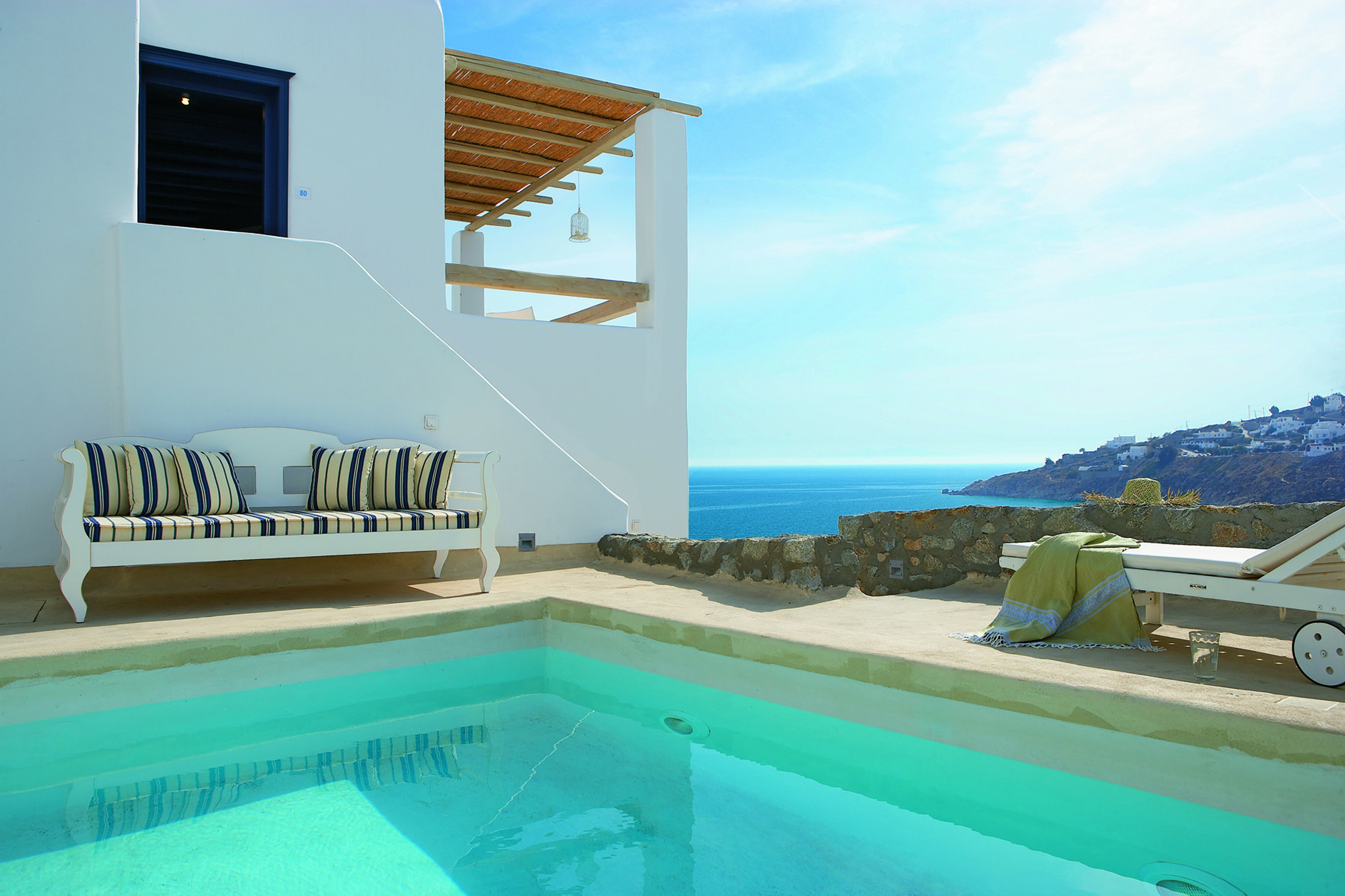 Mykonos Blu Greece Grecotel private pool with sofa and sun lounger