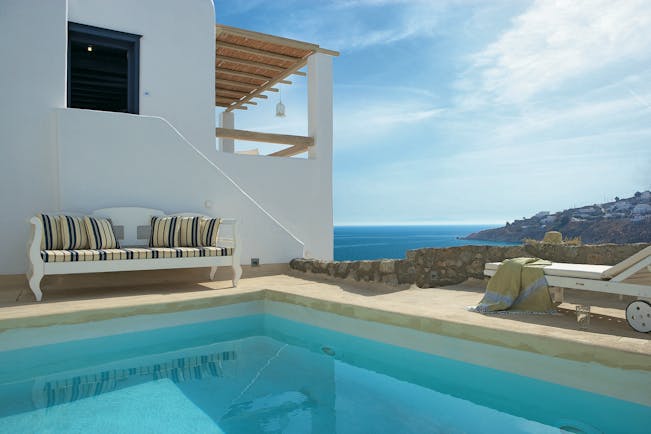 Mykonos Blu Greece Grecotel private pool with sofa and sun lounger