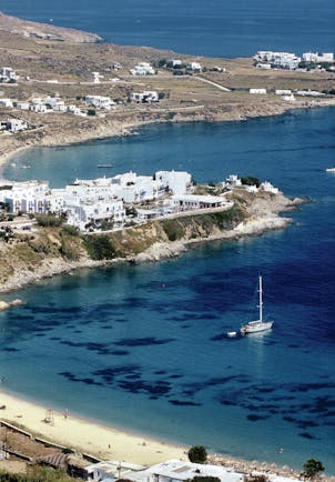 Petasos Beach Resort Greece exterior aerial view of coastline and boat