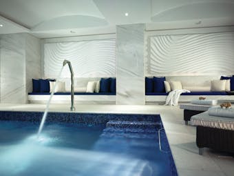 Petasos Beach Resort Greece indoor spa pool with sofas