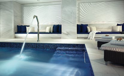Petasos Beach Resort Greece indoor spa pool with sofas