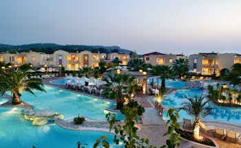 Porto Sani Greece exterior aerial view of hotel with several large outdoor pools