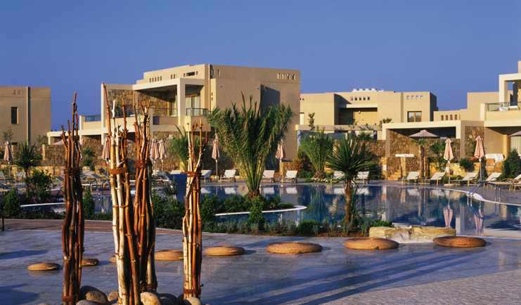Sani Asterias Greece pool view loungers palm trees hotel view