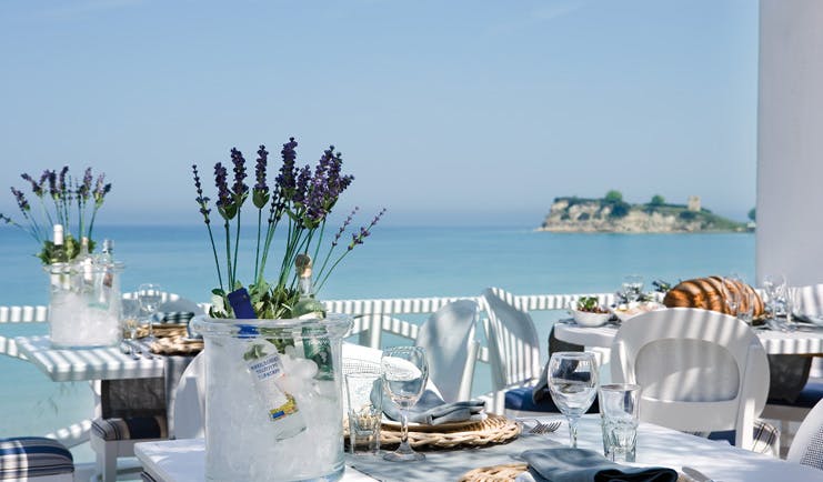 Sani Club Greece Ouzerie outdoor dining Ouzo on ice lavender sea view