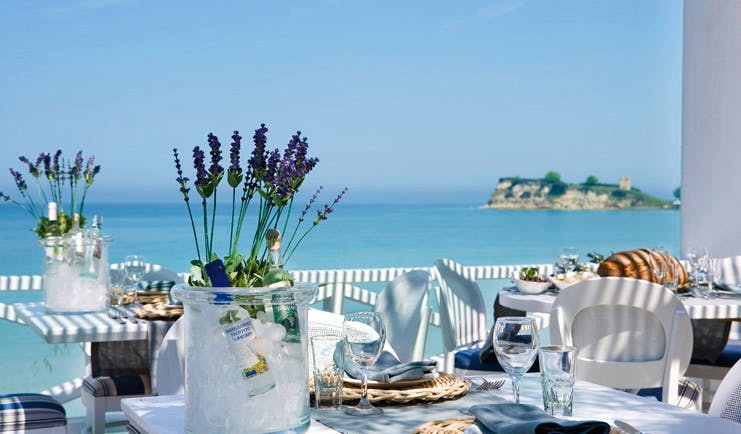 Sani Club Greece Ouzerie outdoor dining Ouzo on ice lavender sea view
