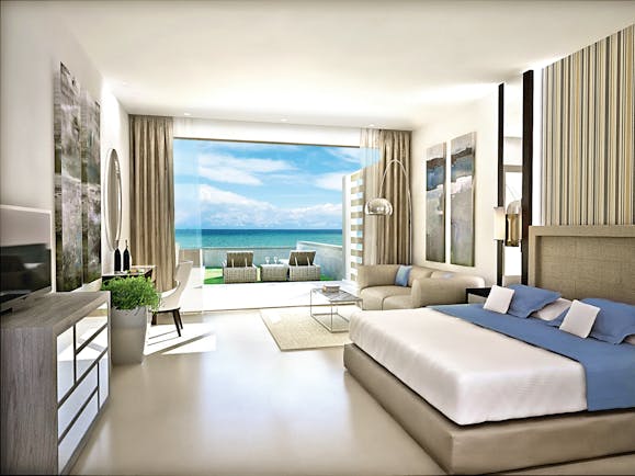 Sani Dunes Greece junior suite gardens bedroom and lounge garden with sea view