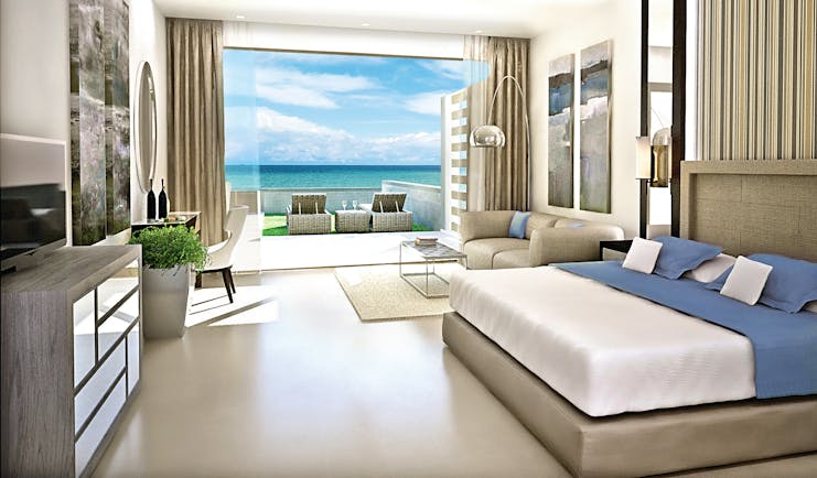 Sani Dunes Greece junior suite gardens bedroom and lounge garden with sea view