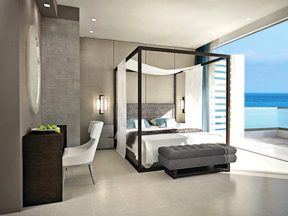 Sani Dunes Greece junior suite sea view bedroom with four poster bed and balcony