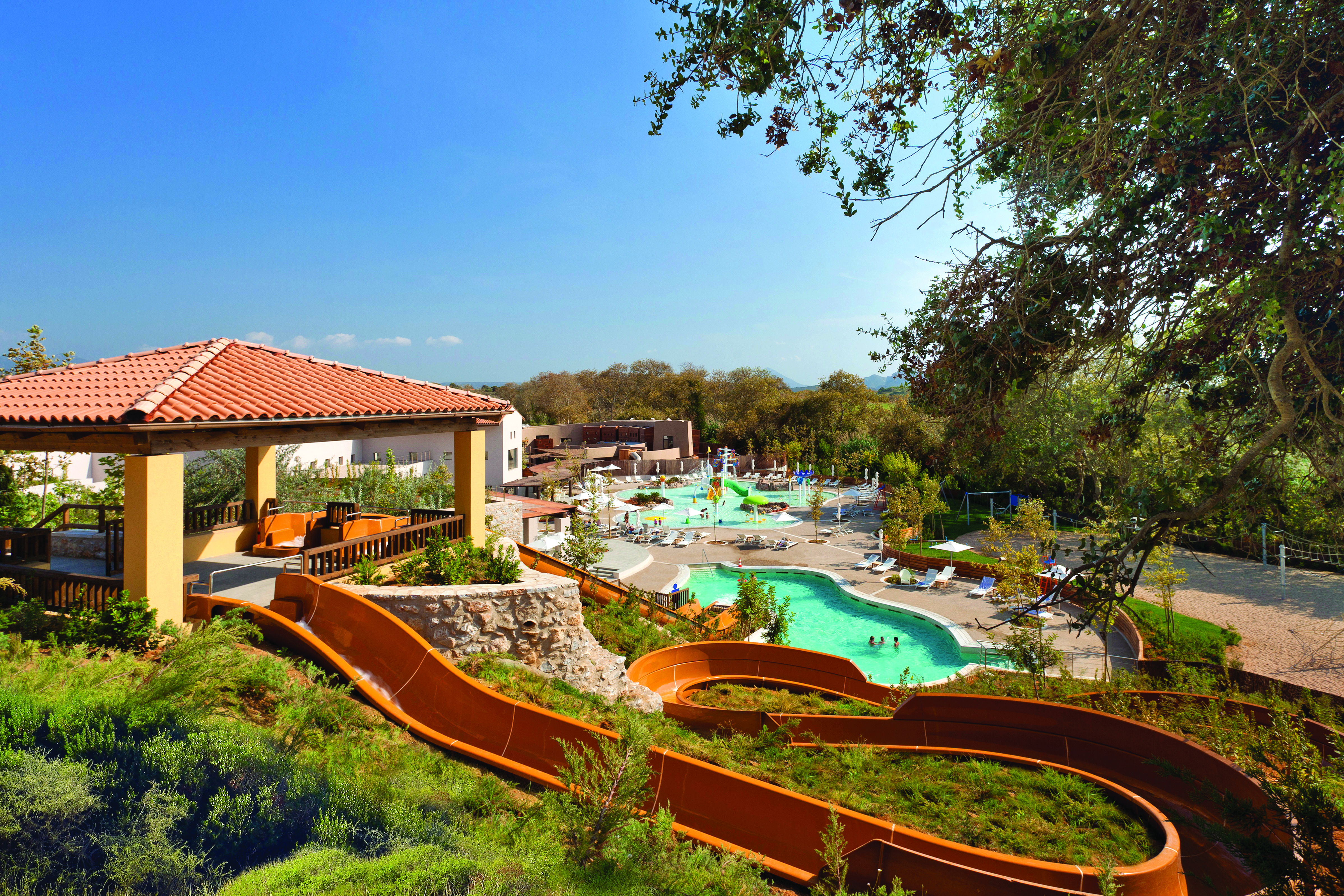 The Romanos Greece aquapark outdoor swimming pool with flumes