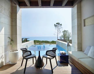 The Romanos Greece balcony private pool decked area and sea view