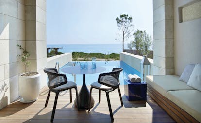 The Romanos Greece balcony private pool decked area and sea view