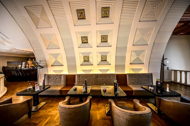 Continental Hotel gallery cafe, modern architecture with curved, carved walls and geometric patterns