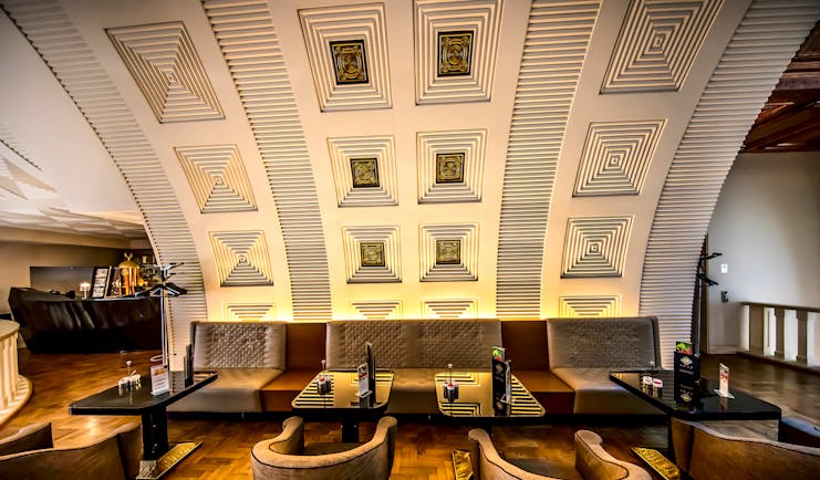 Continental Hotel gallery cafe, modern architecture with curved, carved walls and geometric patterns