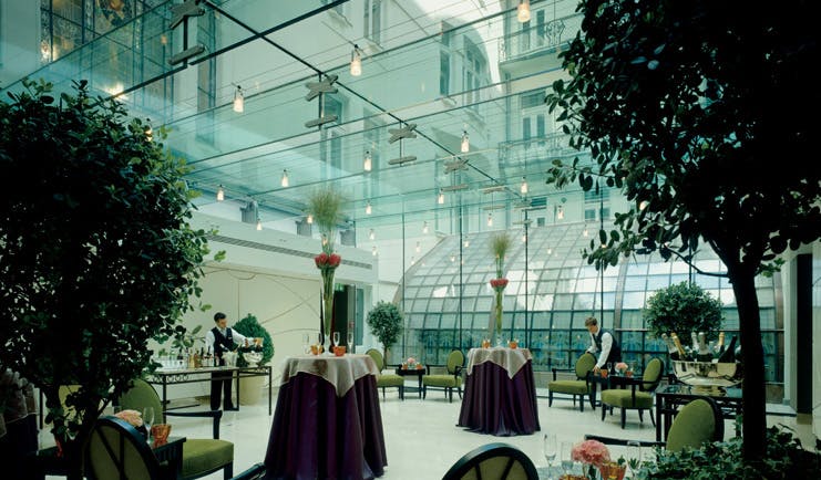 Four Seasons Gresham Palace Hungary conservatory dining area indoor trees