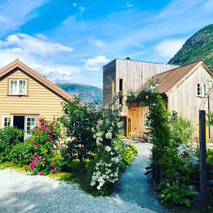 292 Aurland old and new building with flowers