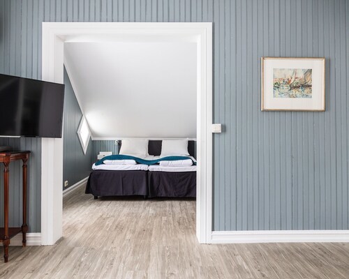 Fru Haugans Hotel suite with separate living room