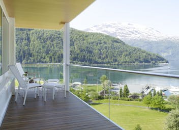 Hotel Alexandra Loen glass fronted balcony giving wide views of fjord