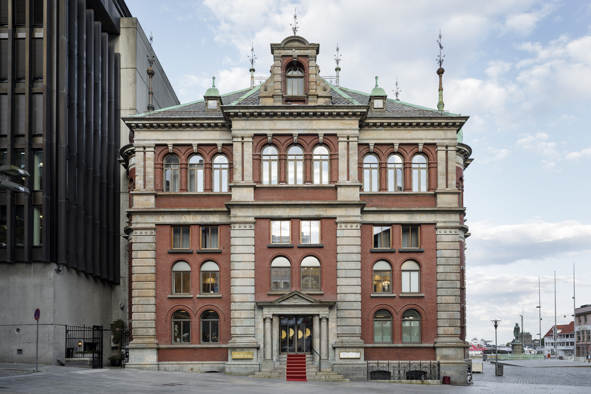 Redbrick exterior by quayside of Bergen Bors hotel