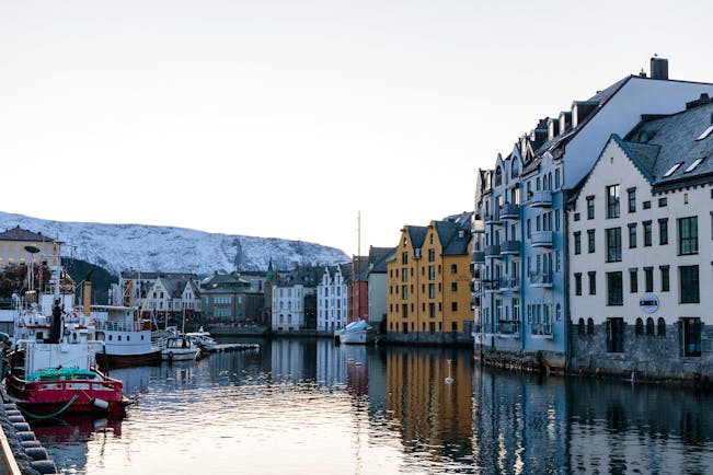 Hotel Brosundet Alesund harbour with boats and warehouses