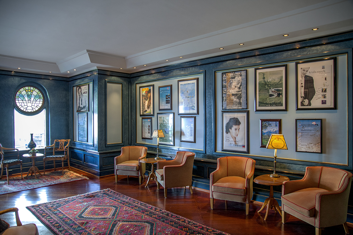 Hotel Ullensvang Norway salon with chairs and paintings