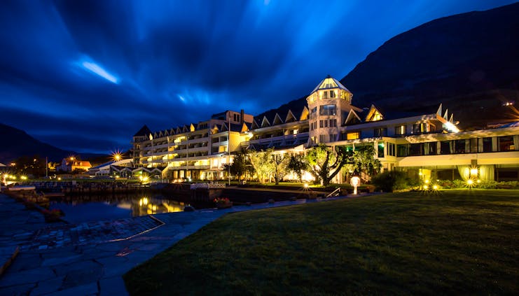 Hotel Ullensvang Norway night scene of hotel illuminated