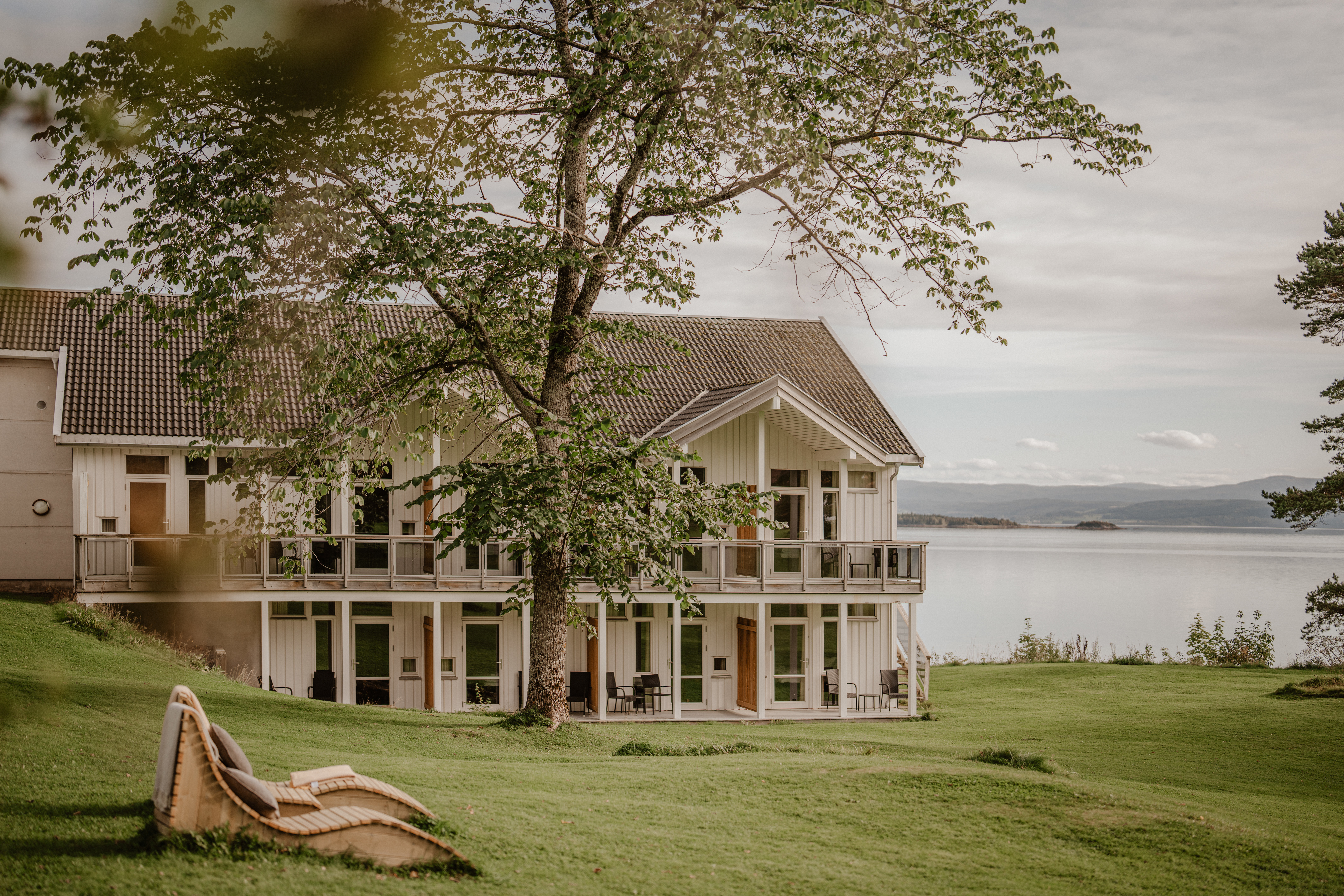Jegtvolden Fjordhotell exterior with fjord in background