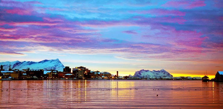 Pink sky at Bodo with snow on mountains