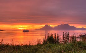 Sunset with water and boat Bodo