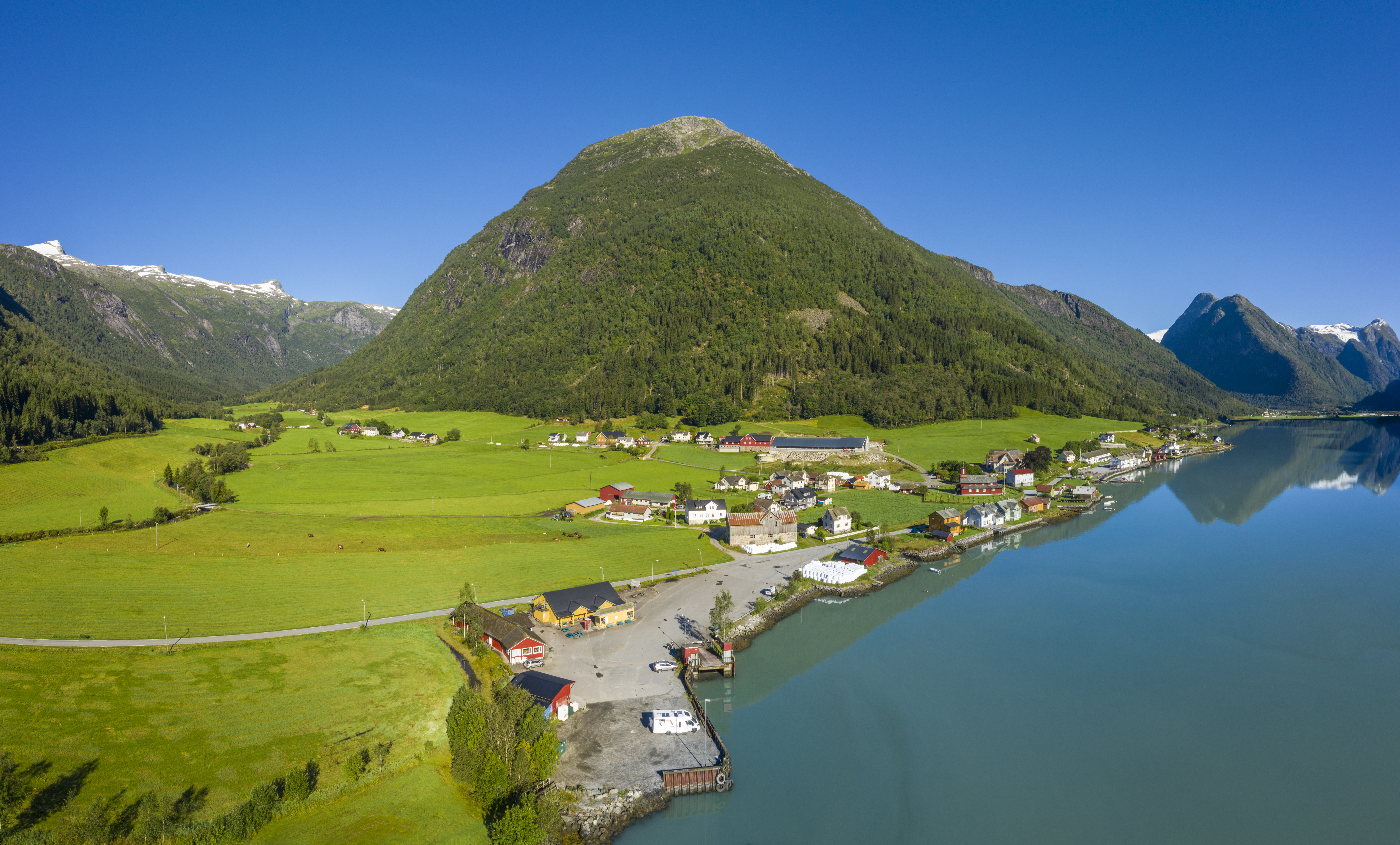 Mountains, hills, village and fjord at Fjaerland