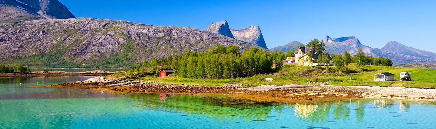 Efjorden Norway mountains, house and bright green blue water